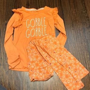 Like brand new Rae Dunn thanksgiving gobble gobble outfit